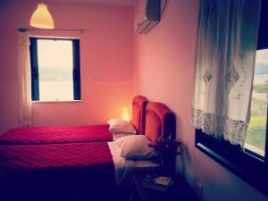 Ένα ή περισσότερα κρεβάτια σε δωμάτιο στο Ravishing View Zastani House 2