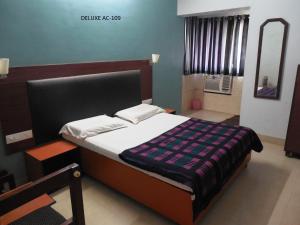 Postel nebo postele na pokoji v ubytování Hotel Silver Springs