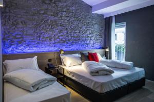 Posteľ alebo postele v izbe v ubytovaní Locanda al Vescovo & SPA