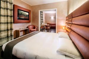 Letto o letti in una camera di Base Hotel