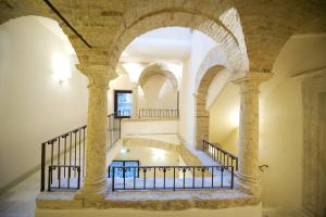 Bazén v ubytování Palazzo Dei Mercanti - Dimora & Spa nebo v jeho okolí