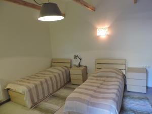 Postel nebo postele na pokoji v ubytování Sno House in Kazbeg