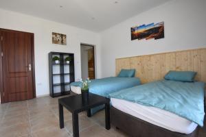 Postel nebo postele na pokoji v ubytování Lago Casa + 28 fotografií