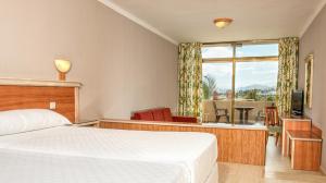 Postel nebo postele na pokoji v ubytování Hotel Beatriz Playa & Spa