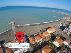 an aerial view of a beach with a red marker at Hotel Aurora in Marina di Cecina