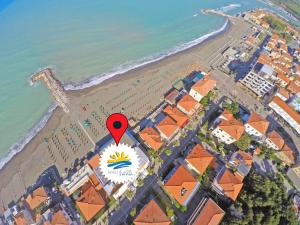 an overhead view of a beach with a red marker at Hotel Aurora in Marina di Cecina