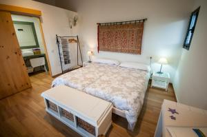 מיטה או מיטות בחדר ב-Casa Rural Cruces de Caminos