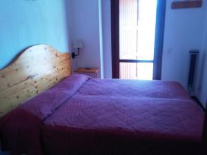 Ein Bett oder Betten in einem Zimmer der Unterkunft Holiday Home Recanati