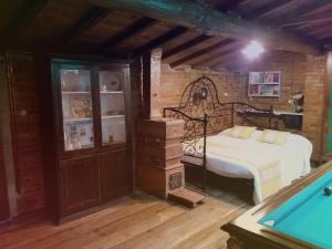 Ένα ή περισσότερα κρεβάτια σε δωμάτιο στο Podere Casina Rossa