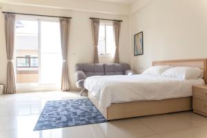 Voodi või voodid majutusasutuse Beyond Home toas