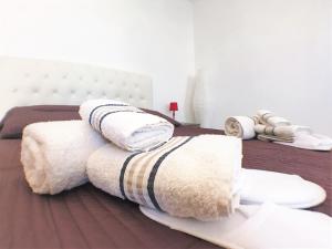 Łóżko lub łóżka w pokoju w obiekcie Chianciano Lettings