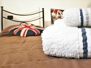 Łóżko lub łóżka w pokoju w obiekcie Chianciano Lettings