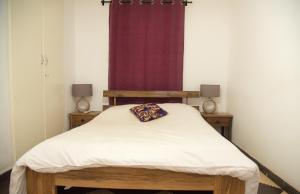 Voodi või voodid majutusasutuse Umoja Guesthouse II toas