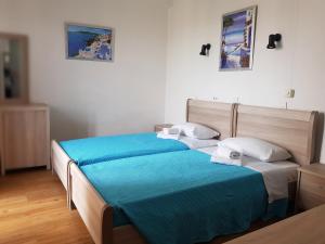 Postel nebo postele na pokoji v ubytování Sparta Team Hotel