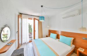 Letto o letti in una camera di Mare Nostrum Apart