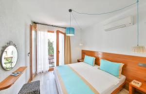 Postel nebo postele na pokoji v ubytování Mare Nostrum Apart