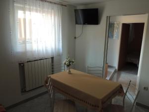 TV a/nebo společenská místnost v ubytování Apartments Palma