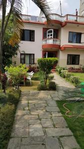 Zahrada ubytování Nepali Cottage Guest House