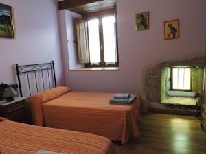 Posteľ alebo postele v izbe v ubytovaní Balkonpe Landa Etxea