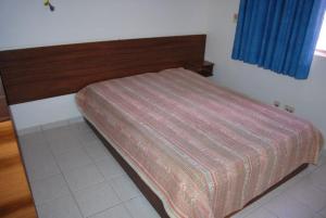 מיטה או מיטות בחדר ב-Prive das Thermas I - 3 Quartos - Achei Ferias