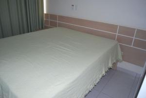 Cama o camas de una habitación en Prive das Thermas II- 3 Quartos - Achei Ferias