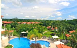 an aerial view of a resort with a pool at Sugar Cane Club Hotel & Spa in Saint Peter