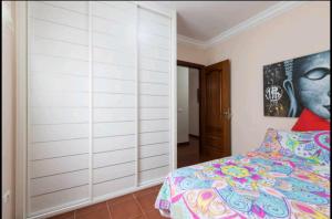Posteľ alebo postele v izbe v ubytovaní Sky House