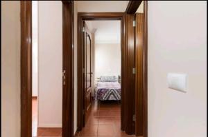 Posteľ alebo postele v izbe v ubytovaní Sky House