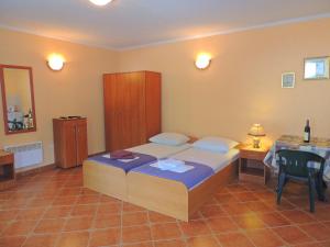 Postel nebo postele na pokoji v ubytování Villa Budvanka Guesthouse