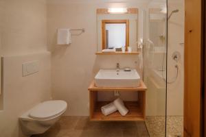 Koupelna v ubytování Hotel Mair