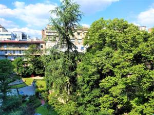 a view of a city with trees and buildings at Vivio Luxury Apartment in Belgrade