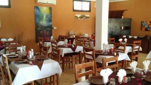 
A restaurant or other place to eat at Le Grand Calao
