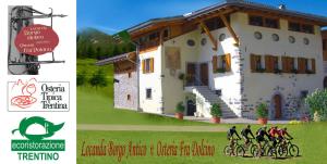 Una foto de una casa con un grupo de personas en bicicleta en Locanda Borgo Chiese, en Condino