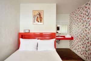 Postel nebo postele na pokoji v ubytování Austin Motel + 37 fotografií