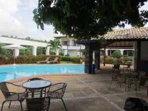 Swimmingpoolen hos eller tæt på Guarajuba Summer Flat 10