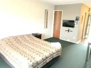 Postel nebo postele na pokoji v ubytování Greenview Motel
