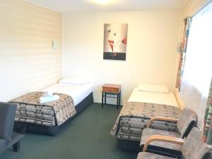 Postel nebo postele na pokoji v ubytování Greenview Motel