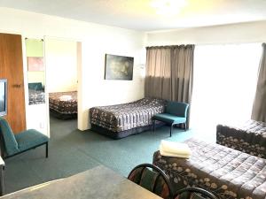 Postel nebo postele na pokoji v ubytování Greenview Motel
