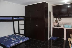 a small kitchen with bunk beds in a room at RV Transient in Angeles