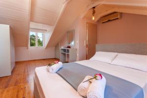 Posteľ alebo postele v izbe v ubytovaní Blue Sea Cottage