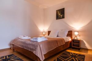 Postel nebo postele na pokoji v ubytování Casa ARBO