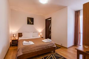 Postel nebo postele na pokoji v ubytování Casa ARBO