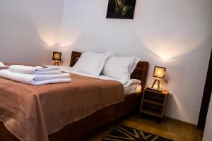 Postel nebo postele na pokoji v ubytování Casa ARBO