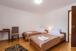 Postel nebo postele na pokoji v ubytování Casa ARBO