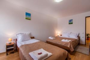 Postel nebo postele na pokoji v ubytování Casa ARBO
