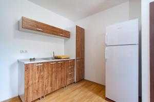 Kuchyň nebo kuchyňský kout v ubytování Casa ARBO
