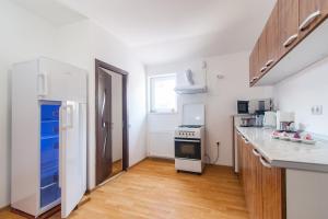 Kuchyň nebo kuchyňský kout v ubytování Casa ARBO