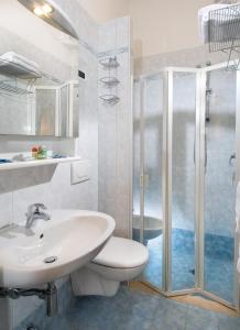 Ett badrum på Hotel Trieste
