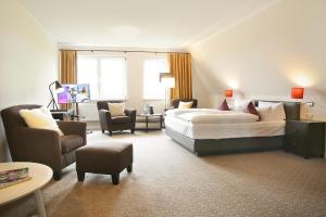 Llit o llits en una habitació de Landhotel Wittenbeck by ANS
