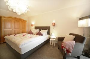 Llit o llits en una habitació de Landhotel Wittenbeck by ANS